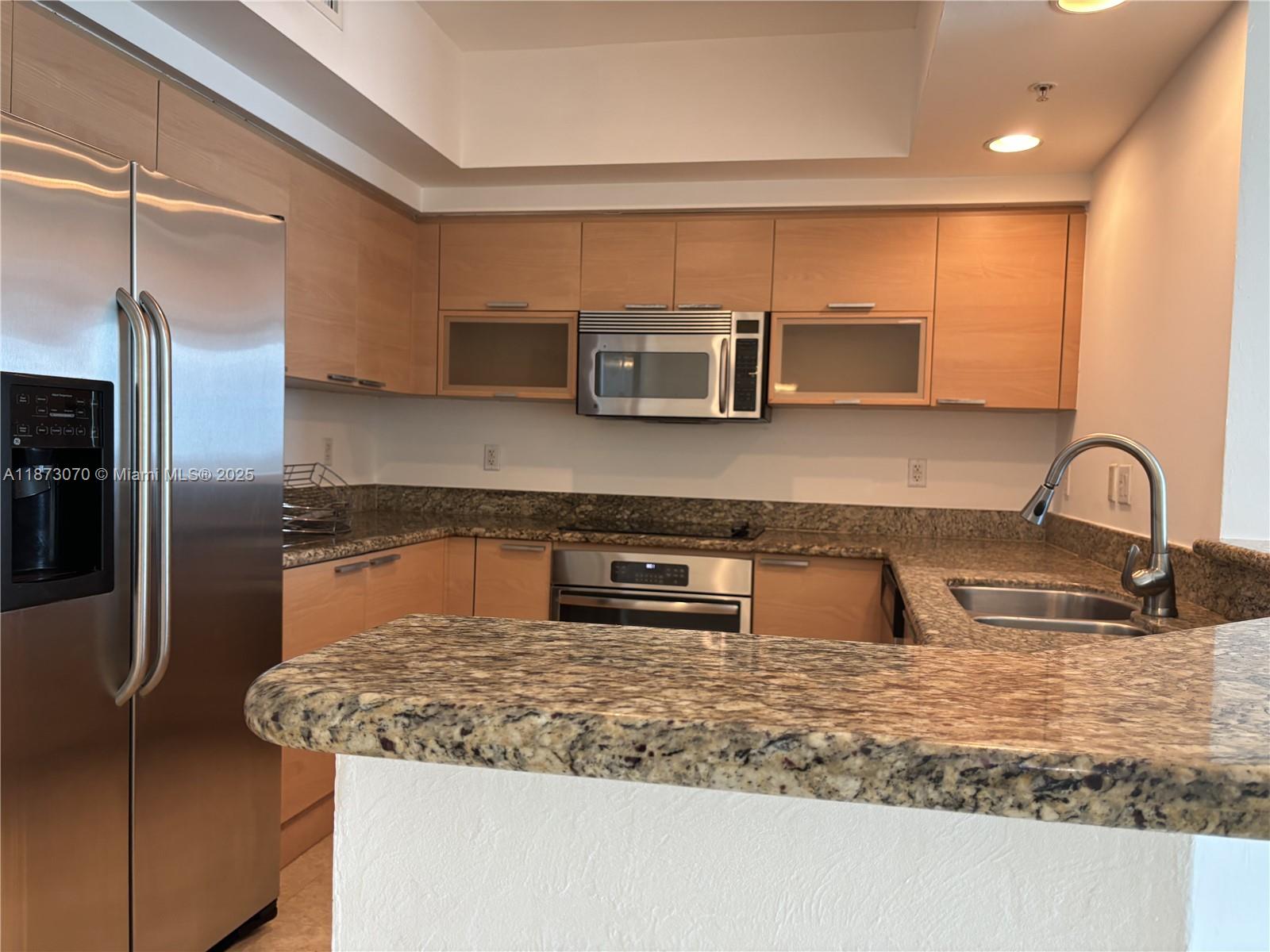 THE OAKS I CONDO - Residential Lease