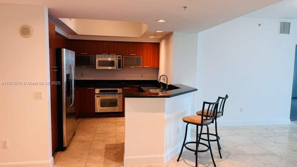 THE OAKS I CONDO - Residential Lease