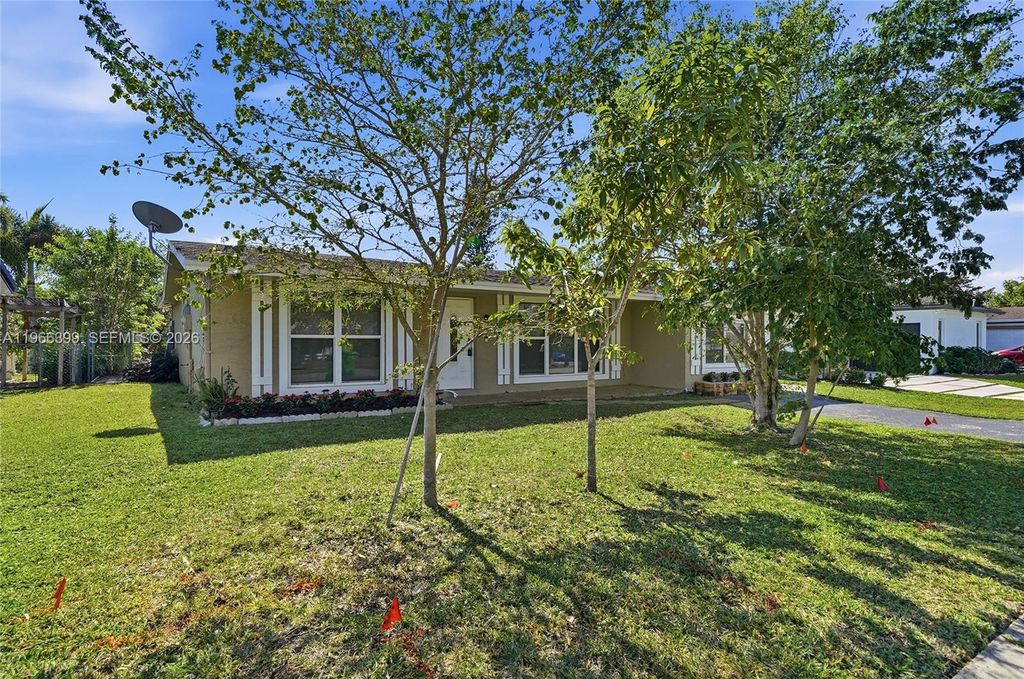 Photo of 11420 NW 32nd Pl, Sunrise, FL 33323 (MLS # A11966399)