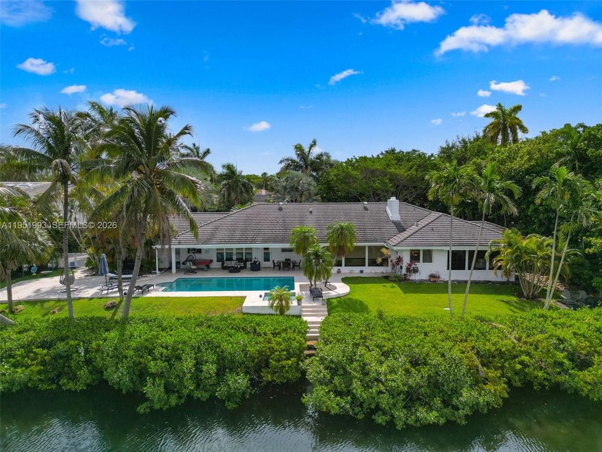 Discover this impeccable lakefront estate located in the prestigious Coral Gables area, tucked away in a quiet cul-de-sac on an oversized lot with the community’s widest, most breathtaking lake views. This home has it all: ? Gated community with top security ? Fully up to code, including SWAT system ? Indoor & outdoor premium speaker sound system ? Exquisite marble and wood floors ? Private gym, jacuzzi, and sauna ? Magnificent salt-heated pool, spa & fire pit ? Whole-house water purification system ? Electric generator for peace of mind ? 210 feet of direct lake access & sprinkler system Here, every evening turns into a masterpiece, with unforgettable sunsets over the lake.Enjoy world-class amenities, unmatched privacy, and the elegant lifestyle that only Coral Gables can offer