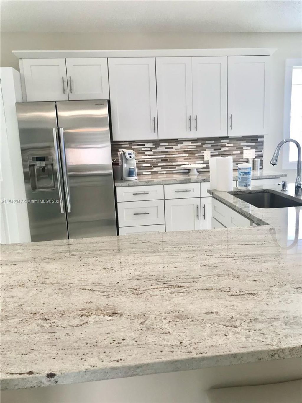 Photo of 9731 Cherry Blossom Ct, Boynton Beach, FL 33437 (MLS # A11642317)