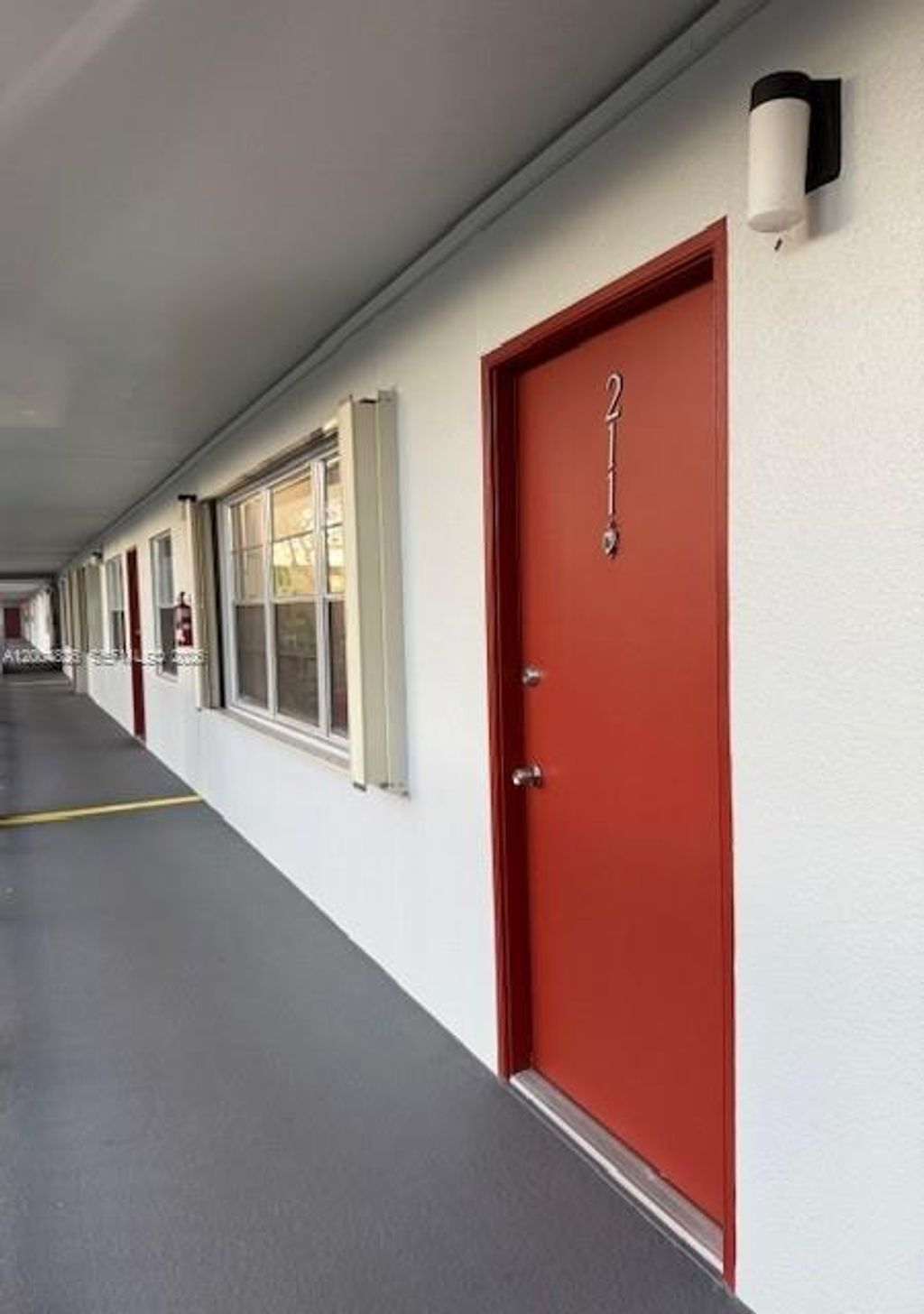 Photo of 1401 SW 134th Way #211C, Pembroke Pines, FL 33027 (MLS # A12004826)