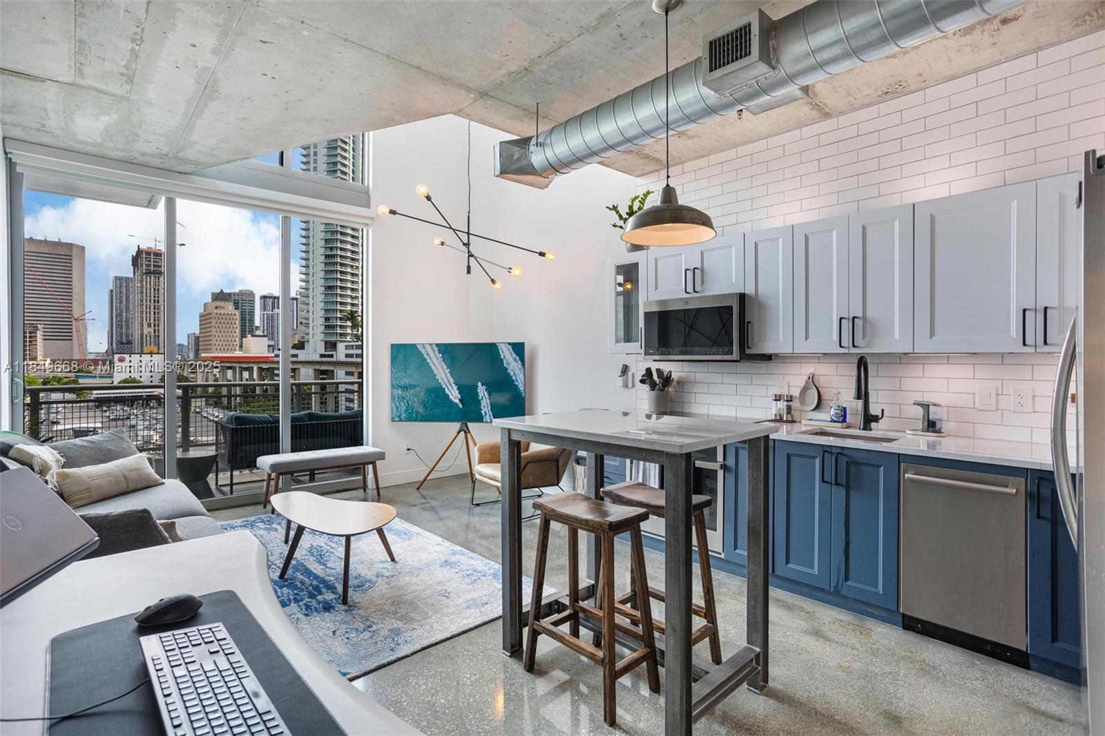 Recently renovated and fully furnished, this two-story 1 bed, 1.5 bath loft at Neo Vertika features 20-ft ceilings, floor-to-ceiling windows with stunning views of the Miami River and skyline, a modern kitchen with Italian-style cabinets, stainless steel appliances, in-unit washer/dryer, and a custom walk-in closet. Neo Vertika offers over 49,000 sq ft of resort-style amenities including an infinity-edge pool, CrossFit gym, racquetball and basketball courts, sauna, steam room, dog park, EV chargers, business center, valet, and 24/7 concierge. Steps from Brickell City Centre, Metromover, and top dining.