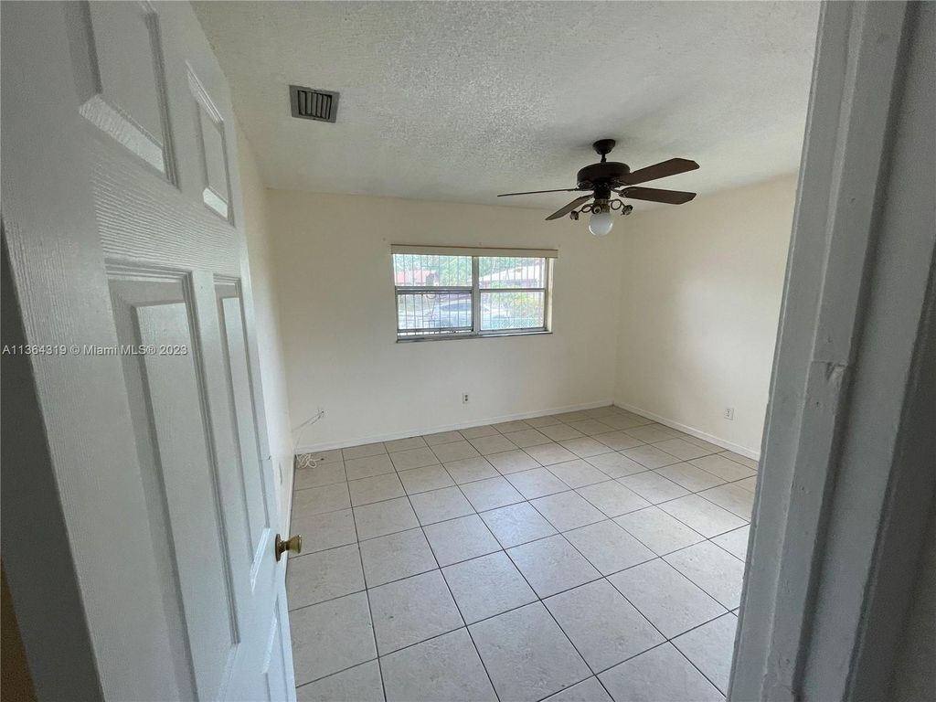 Photo of 2703 Langston Dr, Fort Pierce, FL 34946 (MLS # A11364319)