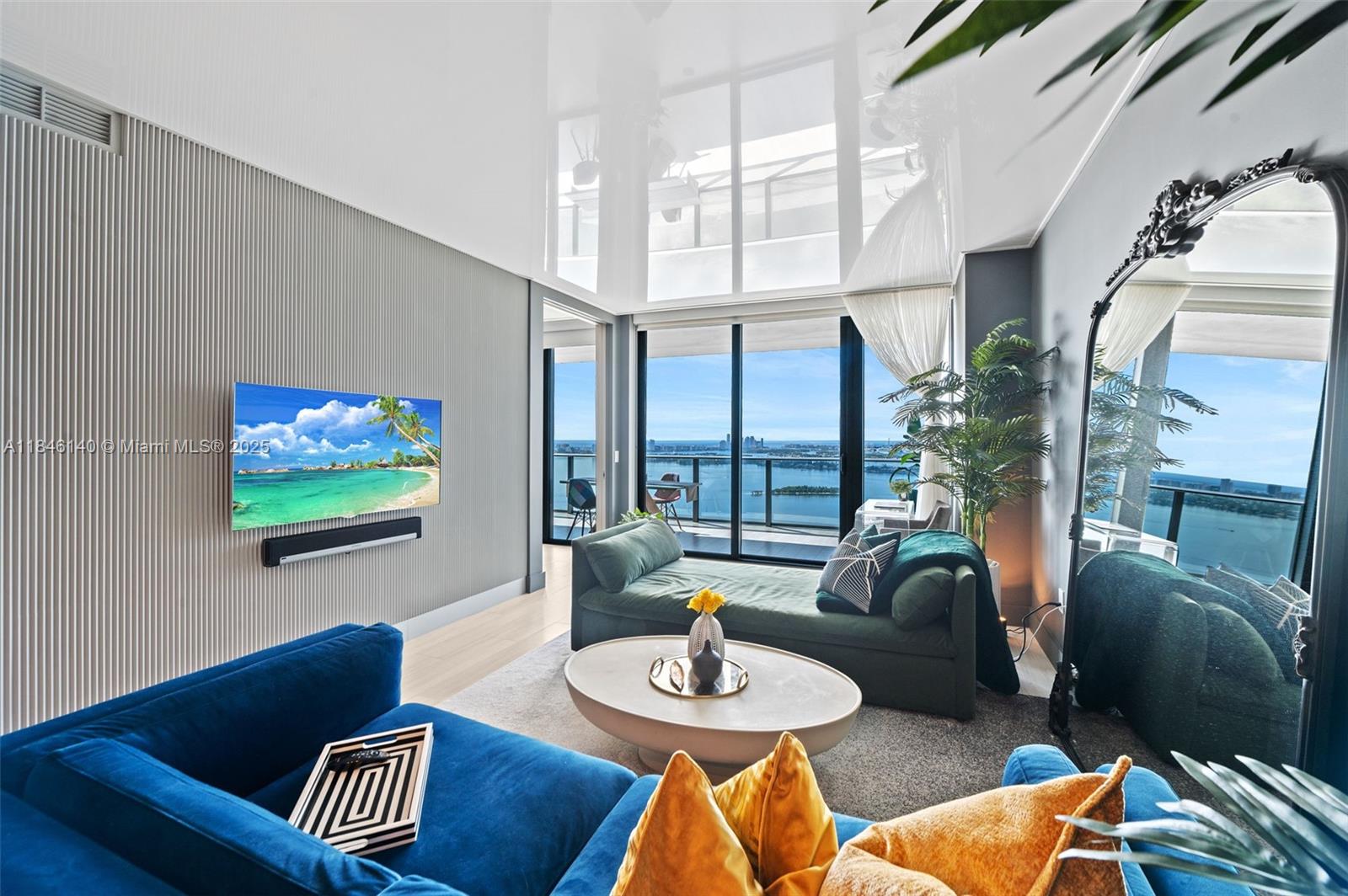 Inspired by Miami Art Deco and the Great Gatsby, this elegant and sophisticated professionally designed remodel at Paraiso Bay Condo is filled with unique luxury finishes and upgrades you must see in person to enjoy its charm and ambiance. Panoramic Southeast exposure of Biscayne Bay, Atlantic and Edgewater skyline, oversized full span balcony: 9’x24’, Custom Lighting Throughout, Boutique Furniture & Art, Reflective Opaque Ceilings, 3D Sculptural Accent Walls, textured Italian Designer Wall coverings, built-in custom closets, whitewashed ceramic faux Oak flooring, 1 car park/valet. Endless amenities include 2 acre amenity pool deck with jacuzzi, tennis courts, fitness/spas, club rooms, indoor/outdoor kitchens/entertainment areas, cigar and wine rooms, game rooms, bowling alleys and more.