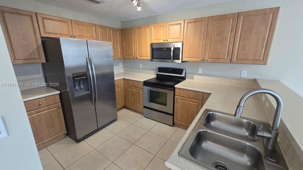 Photo of 11974 Donlin Dr, Wellington, FL 33414 (MLS # A11941361)
