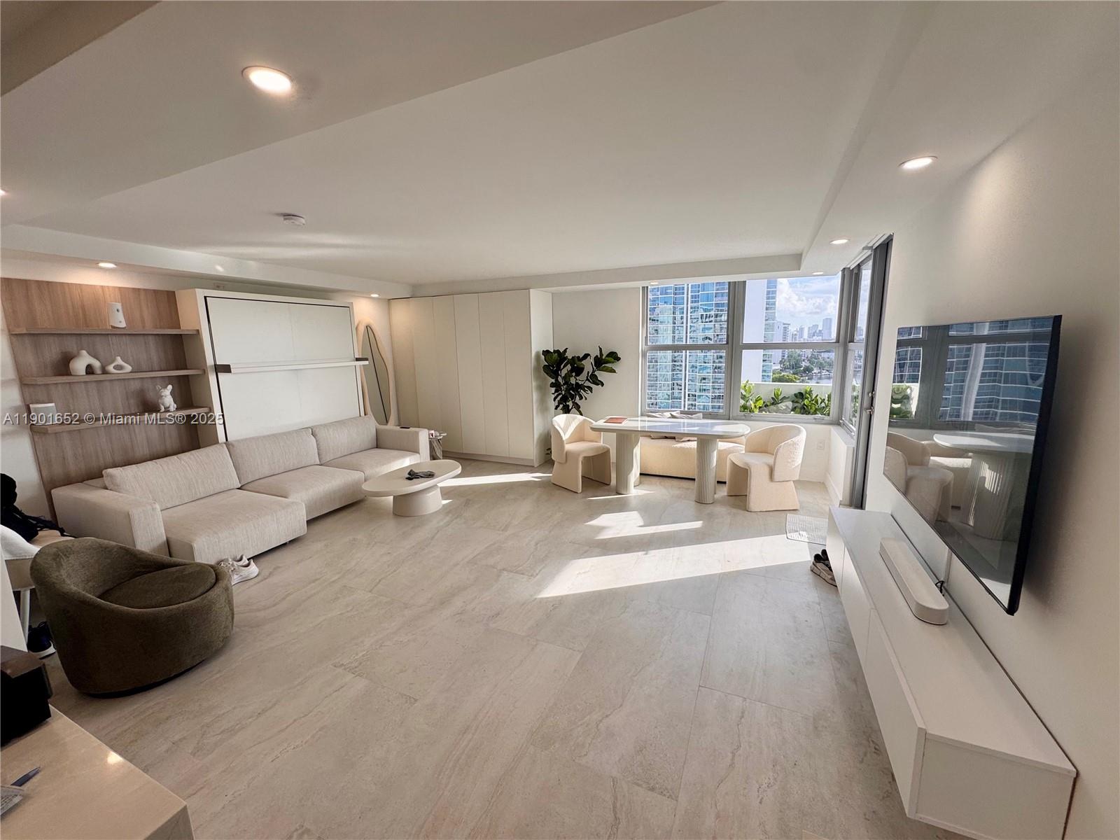 3 - 6 month lease only. Stunning studio with city, ocean, bay, and sunset views paired with a modern pool-side cabana. This custom unit features a large kitchen w/ island, spacious living area + queen Murphy bed, brand storm windows, porcelain tile floors, a oversized glass-enclosed rainfall shower, and west-facing balcony. Rent includes beach service, guest parking, a gym, package concierge, security, two pools and more. Cabana features rainfall shower, mini fridge, and reserved pool chairs. Triton Tower has finished its multi-million dollar 50 yr recertification. Located in the heart of mid-beach, right on the beach walk by five star resorts and restaurants, all of Miami Beach is yours to explore. Parking assigned and paid to the association. Available now through June 1, 2026.
