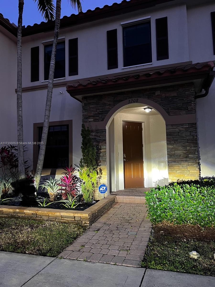 Charming and well-kept 3 bedroom, 2.5 bathroom townhouse in the exclusive gated development of Martinique of Isles of Oasis in Homestead. You will love the beautiful kitchen with stainless steel. There is plenty of natural light, and the property is freshly painted. Washed and driver inside. The fenced backyard is spacious with plenty of room for outdoor entertaining and storage. Discover this stunning townhouse in a gated community with a clubhouse. front parking with EV charging access, and bright, modern spaces in excellent move-in condition. Located in a prime area with easy access to everything you need.