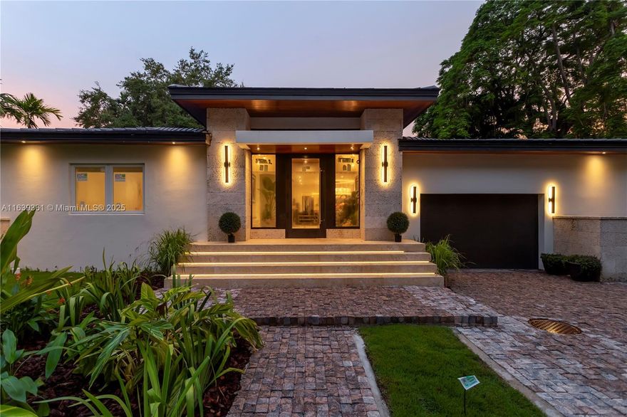 Proudly presenting a meticulously designed custom home in the heart of Coral Gables. Located on an oversized 11,000SF lot between Blue and Bird Roads, this recently completed masterpiece boasts a 5-bed/4.5-bath configuration, designed for a very discerning buyer. The home features a grand entry foyer, floor-to-ceiling windows overlooking a lush backyard, a dream chef's kitchen with high-end appliances, RH lighting, and stunning designer finishes throughout. Materials include coral stone, oak floors, Turkish Travertine, mosaics, and luxury plumbing fixtures. The secluded entertainer's paradise includes unique outdoor spaces with custom lighting -- contact to inquire about approved pool plans. No expense was spared to make this home truly one of a kind.