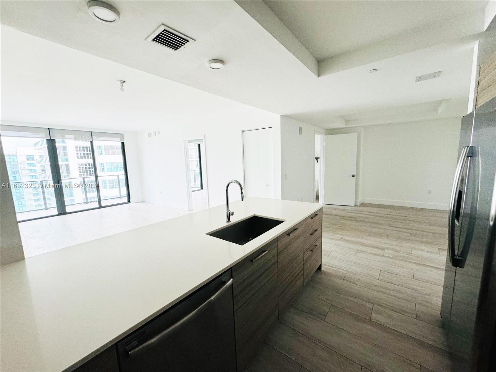 This extraordinary property is located in the heart of Midtown, with restaurants and shops. Newer construction at the Hyde Residence and ready to move in this 2-bed 2-bath. The upgraded kitchen includes stainless steel appliances. Large balcony with beautiful view, which overlooks Midtown, Edgewater, and bay. Private Washer/Dryer. 1 Assigned Parking + extra options. The Hyde offers 5-star amenities, a pool, full gym, 24-hour valet parking, a business center, spa, playroom, and business center.