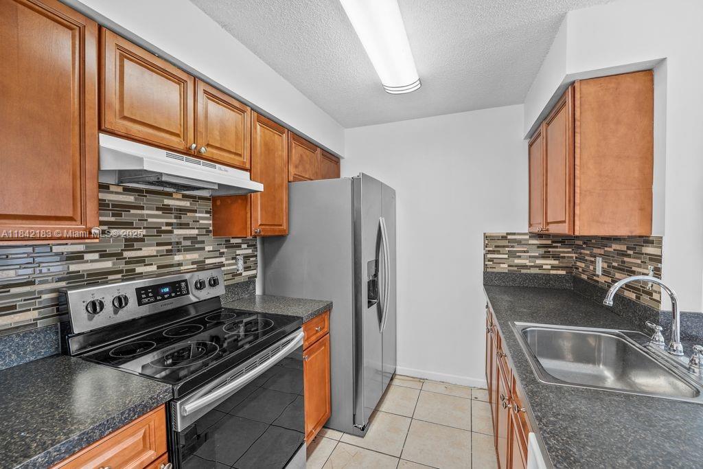 LOCATION!LOCATION!LOCATION!This spectacular and beautiful 2bed/2bath unit is in the heart of Pembroke pines.The safe, super clean and Maintained community of Bella grand is very close to A+schools of Pembroke pines, pines city center, best shopping, entertainment, high end restaurants and more! Stainless steel appliances, remodeled bathrooms, freshly painted walls, walk in closets in this Spacious unit makes a person fall in love with this Condo.Super easy Association approval in just 1 day. Community has all amenities like swimming pool, club house, tennis court, kids play area, bike, jogging path and more! Separate Storage and covered patio outside the unit.