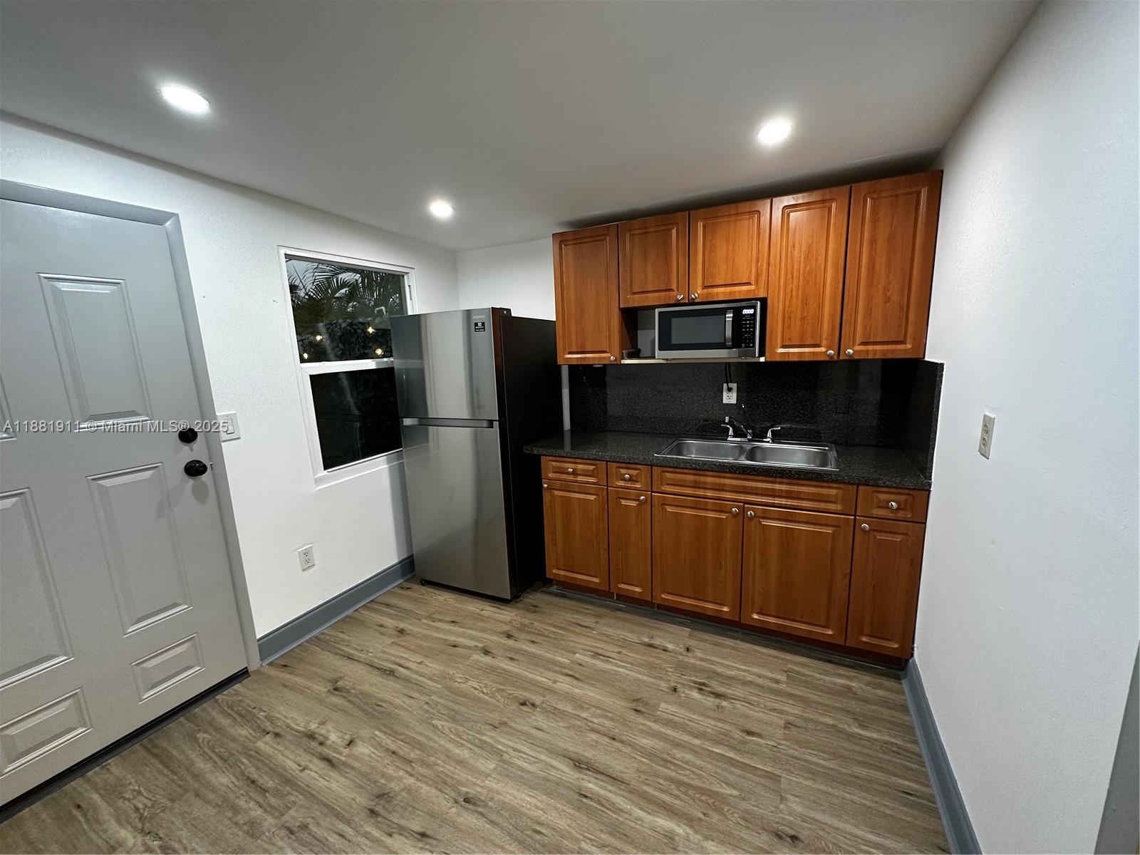 Beautiful and spacious 1 bedroom unit in the center of Miami, close to everything Miami offers. The unit has been recently refreshed, and it looks almost brand new. Very private in a gated hallway with a small patio space in the front for small furniture and even a small bbq if needed. Small kitchenette with stainless steel appliances, a dining space plus a separate bathroom, and a spacious bedroom where you can fit a queen or king bed plus a sofa and wardrobe. There is space in the driveway for 2 cars if needed, although one car only is preferred. Utilities and Wifi are included. First month plus one month deposit to move-in. Available Oct 1, easy to show. Text messages are preferred.