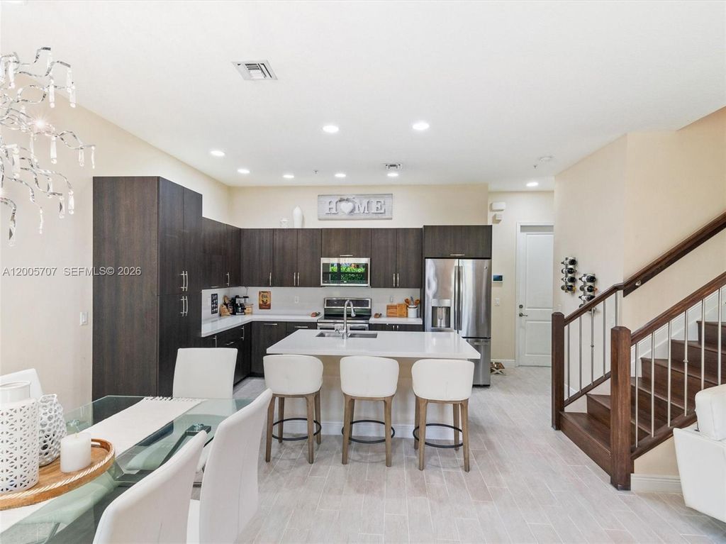 Photo of 12417 NW 17th Mnr, Pembroke Pines, FL 33028 (MLS # A12005707)