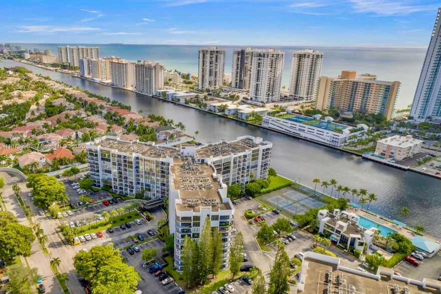 WELCOME TO YOUR WATERFRONT ESCAPE! This RENOVATED & FURNISHED HIGH-FLOOR 2 BED / 2 BATH condo is filled with charm! Enjoy WOOD-LOOK TILE floors, an OPEN EUROPEAN-STYLE KITCHEN with WOOD PLANK COUNTERTOPS and SLEEK APPLIANCES. REMODELED BATHS and a CUSTOM WALK-IN CLOSET add a luxe touch. FLOOR-TO-CEILING WINDOWS fill the space with sunshine and good vibes. Live the RESORT LIFE with a WATERFRONT POOL, TENNIS, GYM, BBQ, CLUBROOM & more. LOW FEES include HOTWIRE TV/INTERNET, HOT WATER & 24HR SECURITY. ASSIGNED PARKING. RENT RIGHT AWAY! Located in gated THREE ISLANDS—just minutes to BEACHES, DINING, SHOPPING, GOLF, GULFSTREAM PARK, AVENTURA MALL & AIRPORTS.