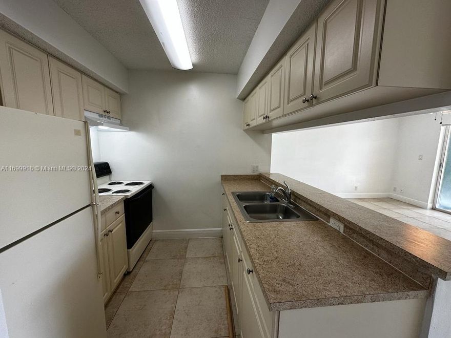 Cozy 1/1 ground floor unit. Recently painted, new vinyl floor in bedroom. Screened patio with lake view. Full size washer and dryer in unit. Located in quiet location at back of complex with canal view. Great amenities: pool, workout room, tennis, clubhouse. New roof installed in 2024. One assigned parking space. Restaurants, shops and supermarket closeby.
Unit has a detached garage rented at an additional $100 per month.
Tenant occupied until March 31, 2025 at $1,650 per month.