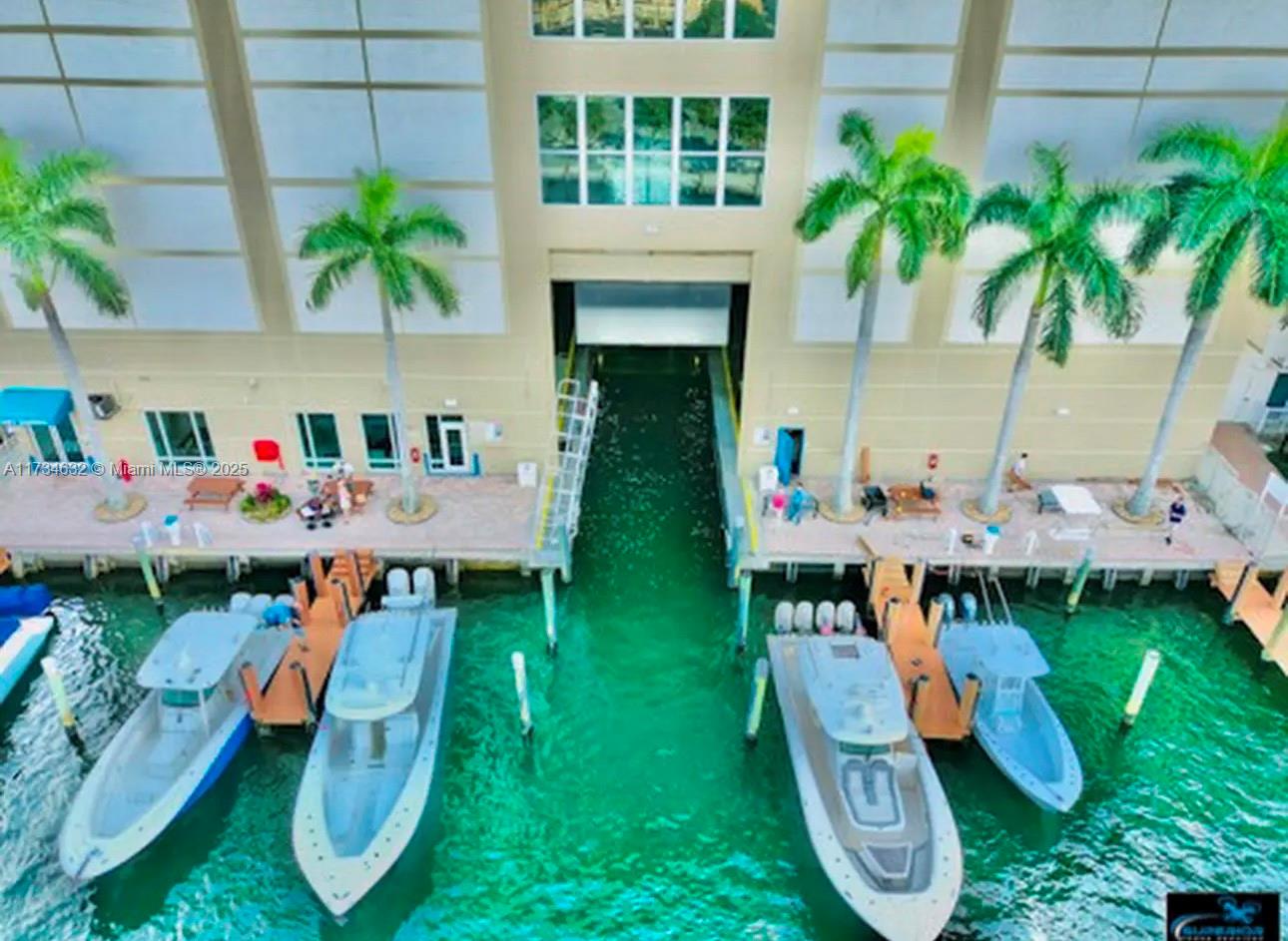 LUXURY DEEDED YACHT STORAGE IN WORLD'S FIRST COMPUTERIZED DRY-STACK MARINA FACILITY FOR YACHTS UP TO 52'LOA, S #5. STATE-OF-THE-ART BRIDGE-CRANE LIFT SYSTEM, FRESHWATER WASH-DOWN, CLIMATE CONTROLLED HURRICANE RATED BU ILDING. A BOATER'S DREAM WITH OWNERS' LOUNGE, RESTROOMS AND SHOWERS, ONLY MINUTES TO THE OCEAN!