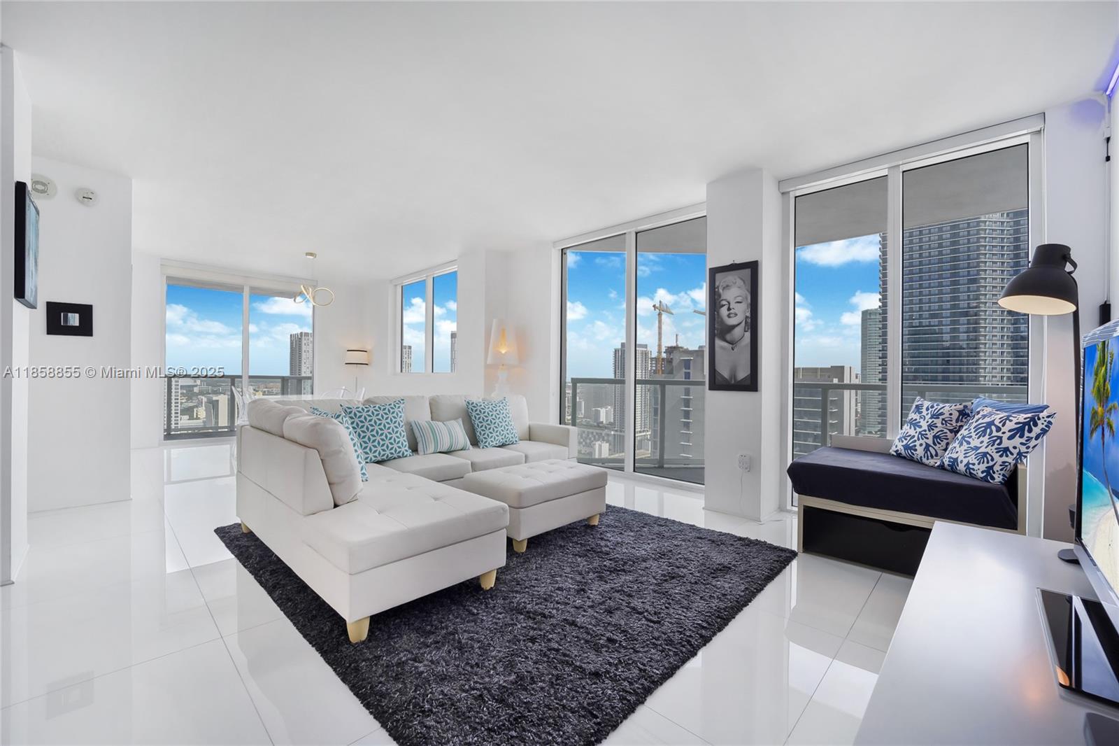 Fully furnished & spacious 2 Bed/ 2 Bath + Den corner unit at Vizcayne South. Enjoy stunning, 33rd floor's views of downtown and bay from two private balconies! Unit features European kitchen w/ stainless steel appliances & granite counters, porcelain tile floors, marble-floored baths, lots of natural light, separate tub & shower in MB. Great full-service building with luxury amenities, 4 resort-style pools, Jacuzzi, fitness center and spa, movie theater, game room, valet services & much more! Excellent location, directly across the streets from the Shops at Bayside and walking distance to the AA Arena and Adrienne Arsht Center. Minutes drive from Brickell & South Beach.