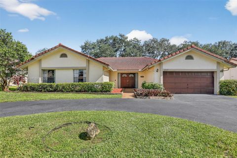 Photo of 8419 NW 55th Ct, Coral Springs, FL 33067 (MLS # A11878505)