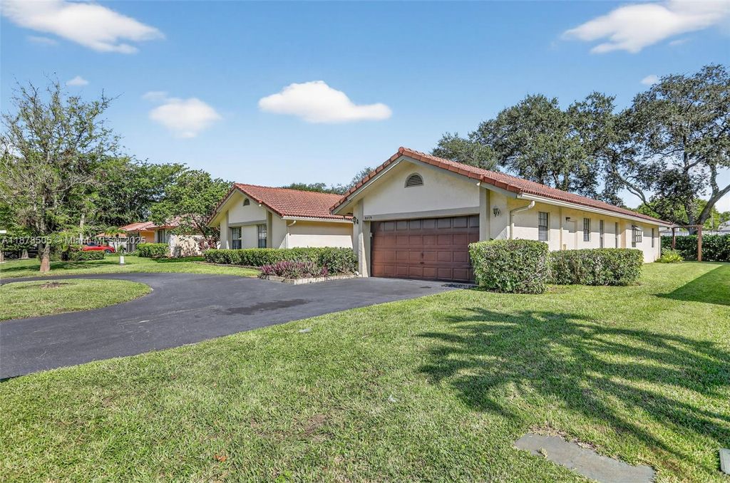 Photo of 8419 NW 55th Ct, Coral Springs, FL 33067 (MLS # A11878505)
