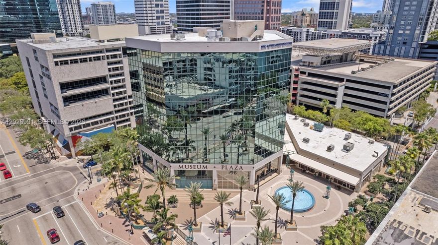 Position your business in the heart of downtown Fort Lauderdale with this exceptional Class A office condo located in the prestigious Museum Plaza building. Offering approximately 2,400 SF of beautifully renovated office space, this turnkey suite combines luxury, functionality, and convenience in one of the city’s most desirable professional locations.

The thoughtfully designed layout features 6 spacious executive offices, a large conference room, welcoming reception area, file/storage room, kitchenette, and an expansive bullpen/open workspace ideal for collaborative teams. Floor-to-ceiling windows throughout the suite provide abundant natural light and stunning downtown skyline views, creating an impressive and professional atmosphere for both clients and employees.

This move-in-ready office is perfect for attorneys, financial firms, real estate professionals, tech companies, medical-related businesses, or any professional group seeking a prestigious downtown presence. The building offers outstanding amenities including live security, secured entry access, electricity included through the association, well-maintained common areas, and a private parking garage with 2 dedicated parking spaces. Ample nearby public parking adds convenience for guests and staff.

Located minutes from Las Olas Boulevard, Brightline, courthouses, restaurants, shopping, and major highways, this property provides excellent accessibility and visibility in a thriving business district. Ideal for owner-users or investors, with the flexibility to occupy immediately or lease for income potential. Rare opportunity to own premium office space in one of Fort Lauderdale’s premier office buildings.