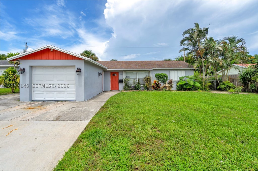 Photo of 1320 W 26th Ct, Riviera Beach, FL 33404 (MLS # A12057140)