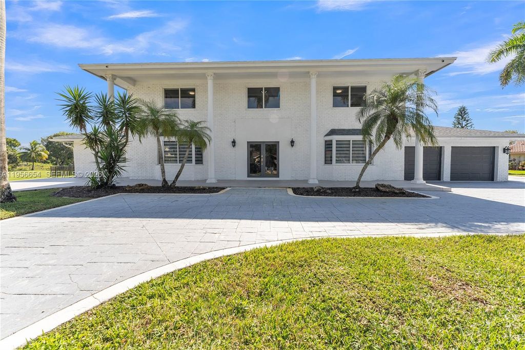 Photo of 11824 SW 43rd Ct, Davie, FL 33330 (MLS # A11956654)