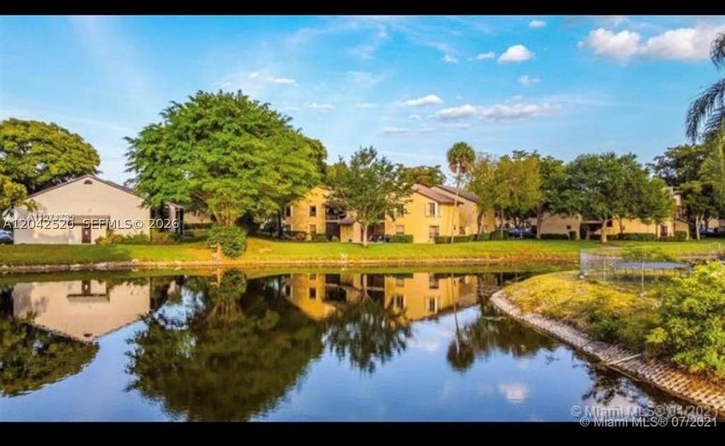 Photo of 3833 Cocoplum Cir #3593, Coconut Creek, FL 33063 (MLS # A12042520)