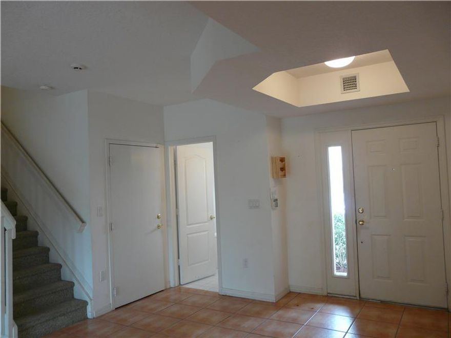 Beautiful 2 story townhouse at Tiffany at Kendall! 3 bed/3 bath,1 car garage. Bright and very spacious. Family and living rooms. High ceilings, eat-in kitchen, tile downstairs, carpet upstairs. Full size washer and dryer in unit, ceiling fans, hurricane s hutters, private back yard. Small gated community of Kendall Drive. All bedrooms upstairs, one full bath downstairs. 2 parking spaces in front of unit. Great location near to Baptist Hospital, shopping, restaurants, expressways and much more!