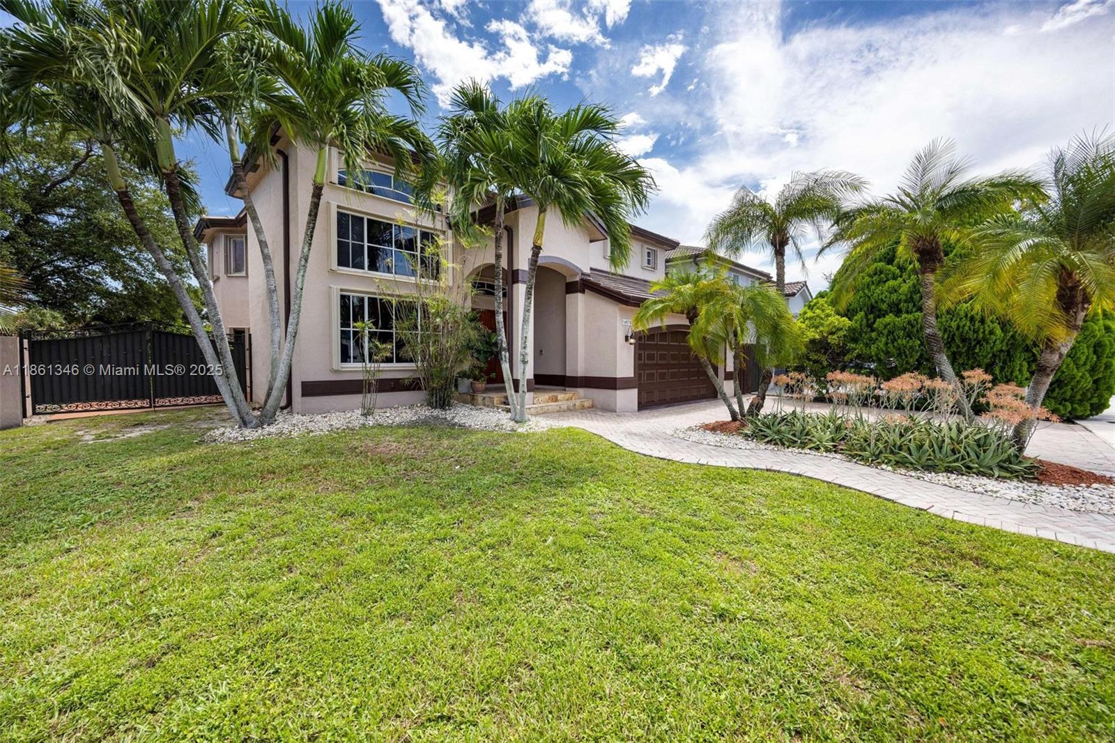 Room for a boat! No HOA! Corner lot home boasts 4BD, 3BA. Enjoy peace of mind with updates that include a new tile roof, water heater, impact-resistant garage door, and newer AC. Inside, you are greeted by cathedral ceilings and a spacious great room. Continue into the generous kitchen open to the family room. The first-floor bedroom and full bathroom are perfect for guests or a home office. Ascend the redesigned grand staircase and enter the double doors into the primary suite including two walk-in closets, dual sinks, a walk-in shower, and Roman tub overlooking bay windows. The third and fourth bedrooms are anchored by the third full bathroom. The fenced backyard offers a covered patio, wet bar, shed, and new sod. Full accordion shutters and impact-resistant doors offer peace of mind.