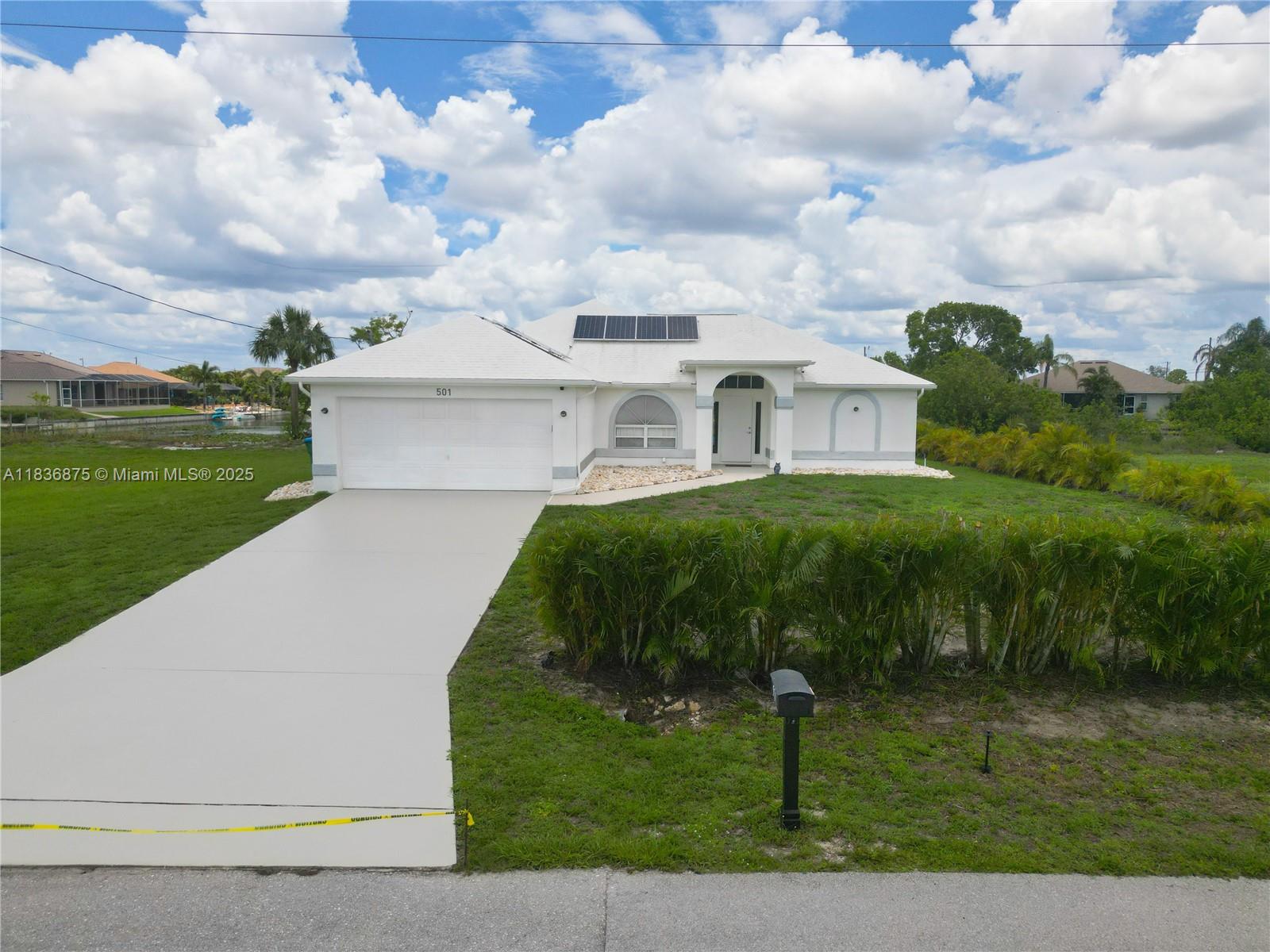Waterfront Pool Home with Solar in exclusive Cape Coral! Beautifully updated 4-bedroom, 2-bath pool home in one of the most desirable waterfront neighborhoods in SE Cape Coral. Enjoy direct access to Saratoga Lake and explore the canal system leading to Shamrock Lakes and Lake Kennedy—perfect for boating enthusiasts! This is no ordinary water view. You have intersecting canal view, with direct access, and partial view of Saratoga Lake. Owner also has .45 ACRE adjacent land for sale! (429 SE 7th Street) Includes 18 solar panels. Has CITY WATER & SEWER! Hurricane-resistant roof coating, survived 3 major storms with no damage. Enjoy waterfront views, privacy, and modern upgrades in a prime location.