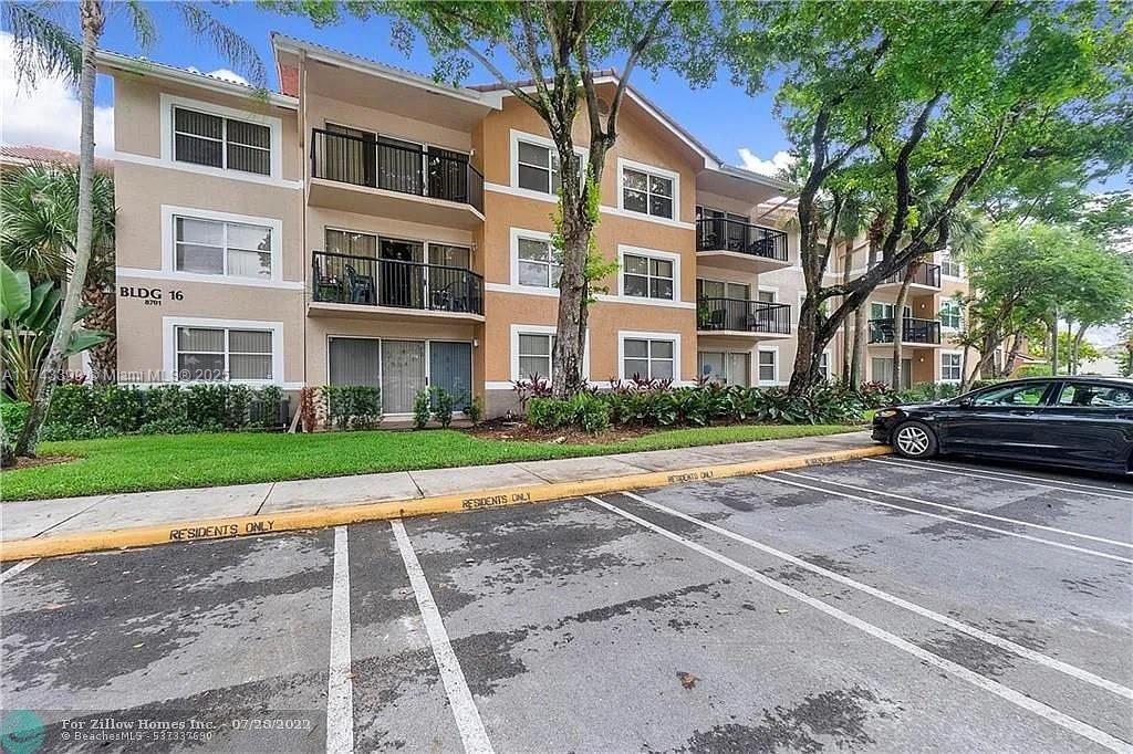 Photo of 8701 Wiles Rd #201, Coral Springs, FL 33067 (MLS # A11743399)