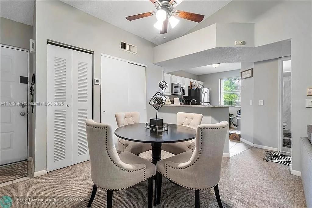 Photo of 8701 Wiles Rd #201, Coral Springs, FL 33067 (MLS # A11743399)