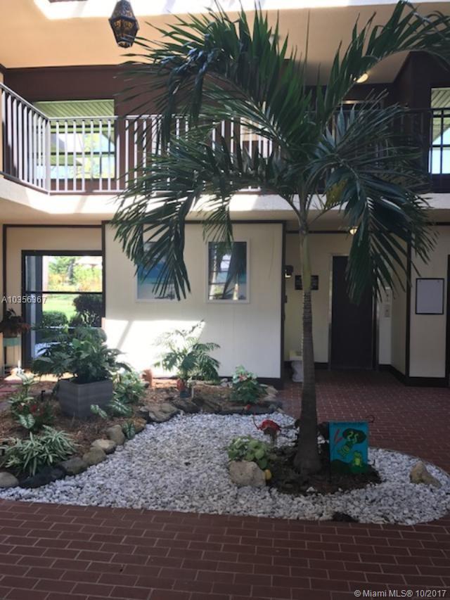 Fabulous amenities at Conquistador. This 2/2 condo is located in a pet-friendly elevator building. Hot water, cable and trash collection in maintenance. Enjoy the beautiful park-like setting from all rooms. Wood-like flooring in living room, split bedroom plan, enclosed porch. Some furnishings available for sale separately. Close to beaches, golf course, shopping and Historic Downtown Stuart. Storage unit on floor, community laundry room just updated.
