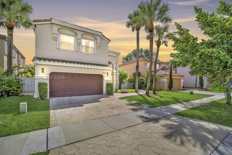 Photo of 325 NW 158th Ln, Pembroke Pines, FL 33028 (MLS # A12094186)