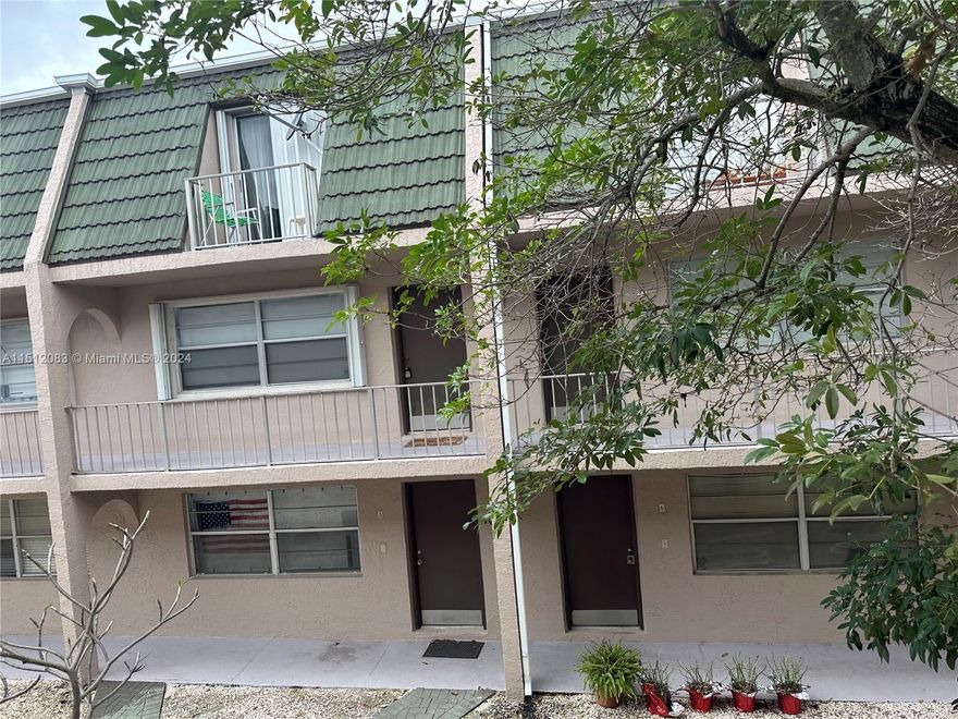 Investor's welcome! Townhome style, located in a small complex in East Deerfield Beach only 2.3 miles to the beach. This beautiful 2 story condo with 2 bed. & 2 bath featuring a large living & dining area, open kitchen w/ s/s appliances, wood cabinets and granite countertop, screened covered terrace, & ceramic tile floors on the 1st floor. Upstairs it has laminate floors, 2 large bedrooms sharing 1 bath w/ great natural light, plenty of closets (7). Full bath downstairs. Master bedroom w/ balcony. Close to everything. Recent concrete restoration, new roof, and others exterior remodels. Condo Fees include Water, Trash, Sewer, Roof Maintenance completed, insurance and reserves. OK to rent first year. Unit located in the second floor (no elevator).Great location just west of Federal hwy!