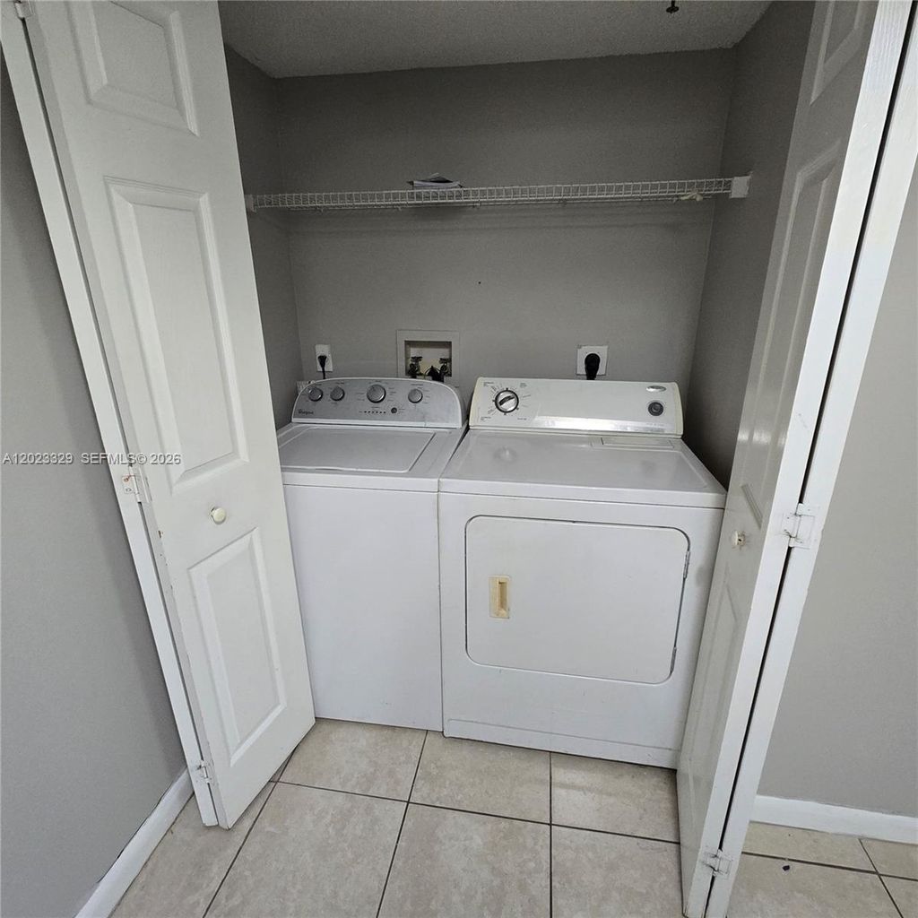 Photo of 5610 NW 61st St #1122, Coconut Creek, FL 33073 (MLS # A12023329)
