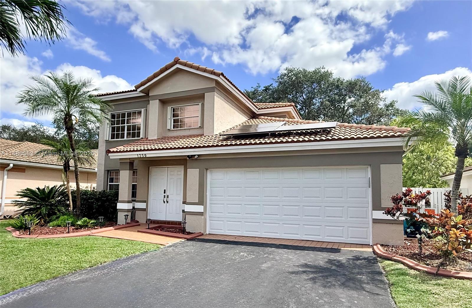 This impressive 2-story pool home offers the perfect layout with the primary bedroom on the first floor, featuring a spa-style soaking tub and separate shower. A finished attic provides tons of extra storage. Enjoy peace of mind with a 3-year-old A/C, eco-friendly solar panels ($65k value), and hurricane accordion shutters. The open kitchen is designed for entertaining with newer stainless steel appliances, gas stove, granite countertops, and flows seamlessly into the living spaces with ceramic and wood flooring. Step outside to a beautiful screened-in heated pool for year-round enjoyment. Additional features include a separate laundry room with brand new washer & dryer and a two-car garage for convenience. Close to major highways, shopping, dining, and excellent schools. Low HOA!