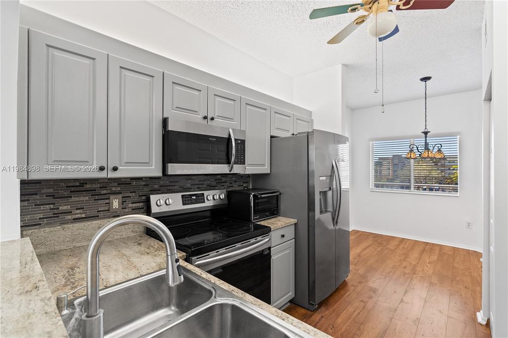 Photo of 7647 Southampton Ter #314, Tamarac, FL 33321 (MLS # A11984898)