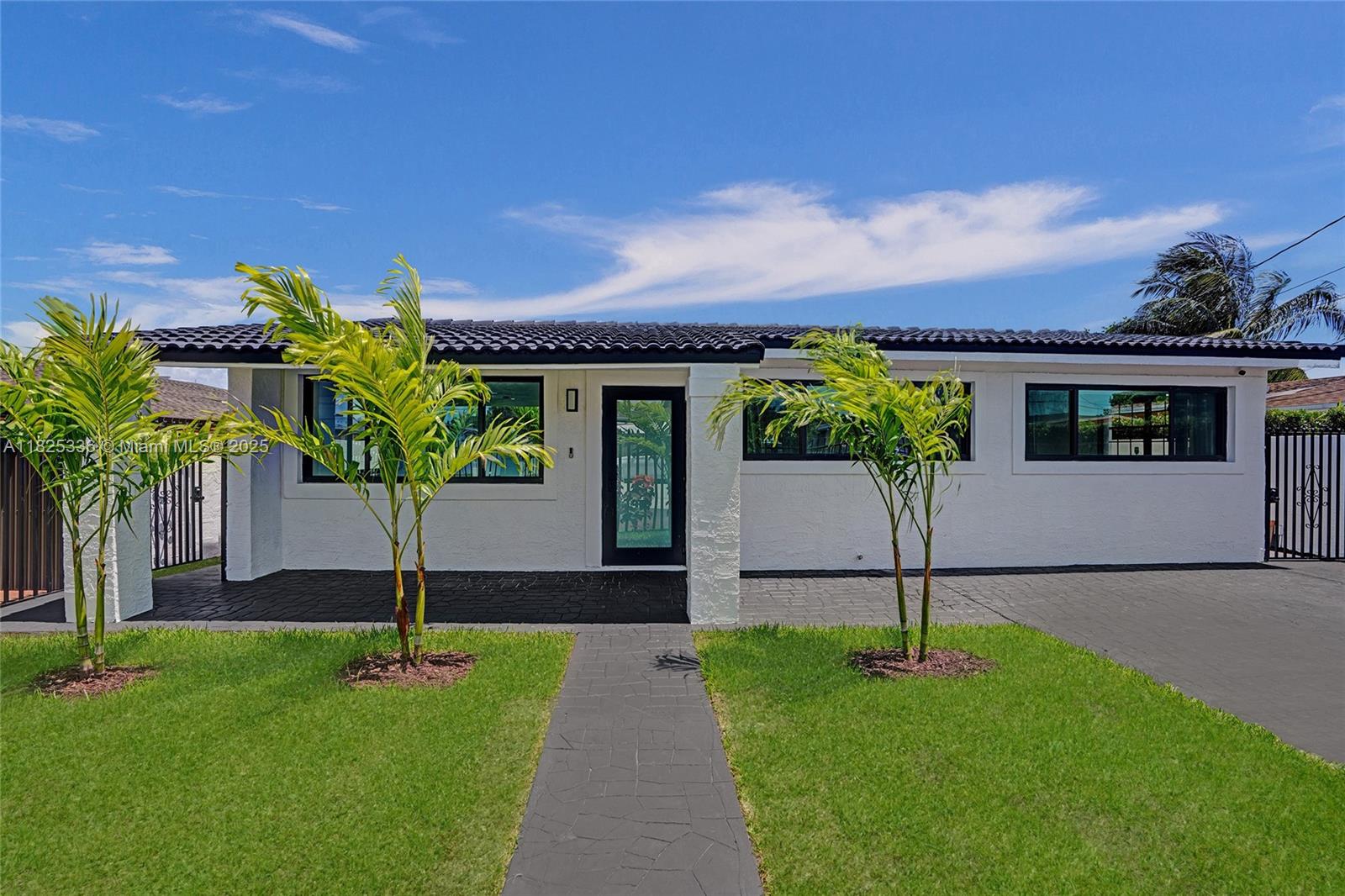 Fully updated and move-in ready, this stunning home sits on a quiet street and features a private, fully gated lot. The serene backyard opens to a canal with ocean access—perfect for enjoying the ultimate South Florida lifestyle. Fish off your dock, paddleboard at sunset, or cruise your small boat straight to the sea. The peaceful outdoor oasis with pool and waterfront views is ideal for entertaining or relaxing.