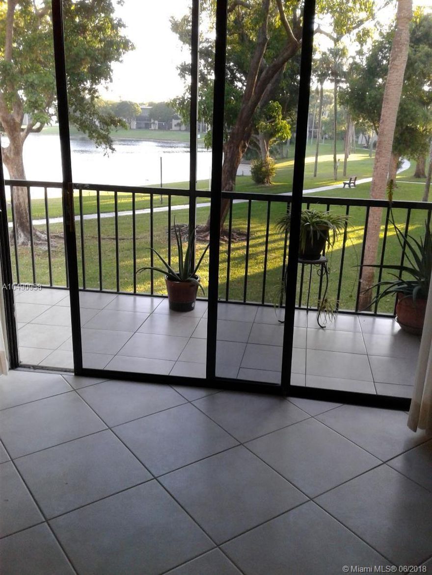 Gorgeous move in ready unit. NO AGE RESTRICTED building. Serene lake view from living room and master bed-room, screened balcony, brand new laminated floors in bed-rooms and tiles throughout in living room and balcony, walk in closet. Building is constructionally sound with extra hurricane protection for AC, which lowers insurance rates.  Las Verdes is a gated community, located minutes from Downtown Delray Beach and pristine beaches. This resort style  community offers heated pools, tennis courts, fitness room, clubhouse, jogging path around the central lake and all year around activities. Unit can be rented after 2 years of ownership. Laundry facilities are conveniently a few doors from the Unit. 
Can be sold furnished or unfurnished.