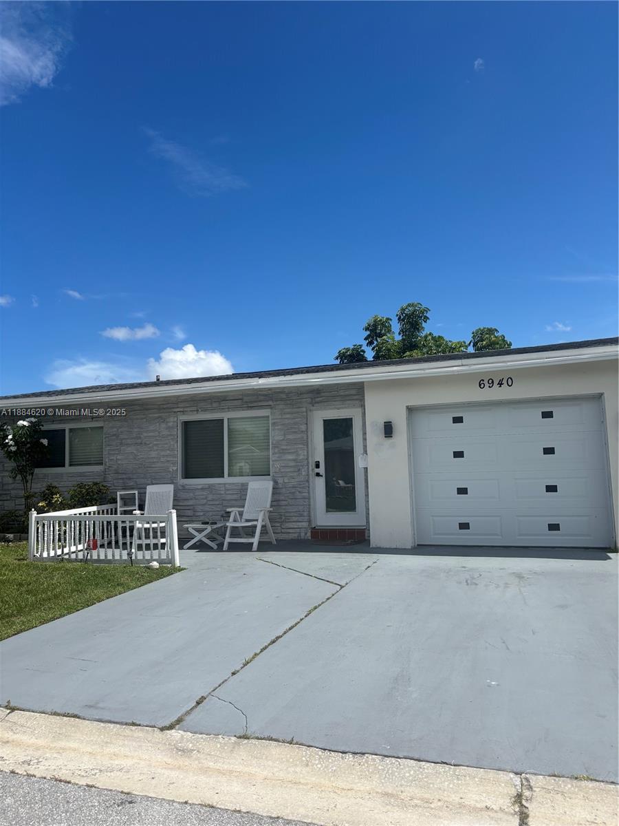 Beautiful home in well desired Paradise Gardens community. This property offers hurricane impact windows throughout and new hurricane impact garage door. driveway fits 2 cars. screened patio with garden views, upgraded kitchen with stainless steel appliances quartz countertops and lots of storage. Laminate waterproof flooring throughout. Roof is seven years old. Very Low HOA fees ($96.00) a month. Clubhouse with Heated saltwater pool and Gym. This is a 55 and over community at least one person has to be over 55 and a 700-credit score is required. This home is close to Major Highways, Beaches, Casinos and hospitals. Great Neighborhood.