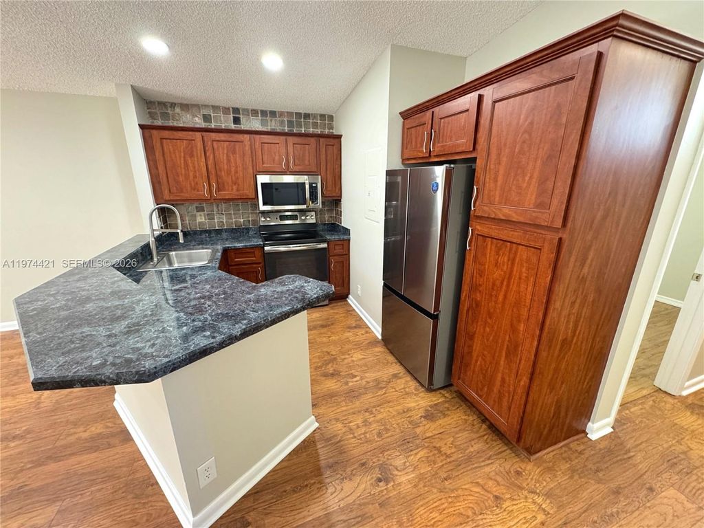 Photo of 22278 Misty Woods Way, Boca Raton, FL 33428 (MLS # A11974421)