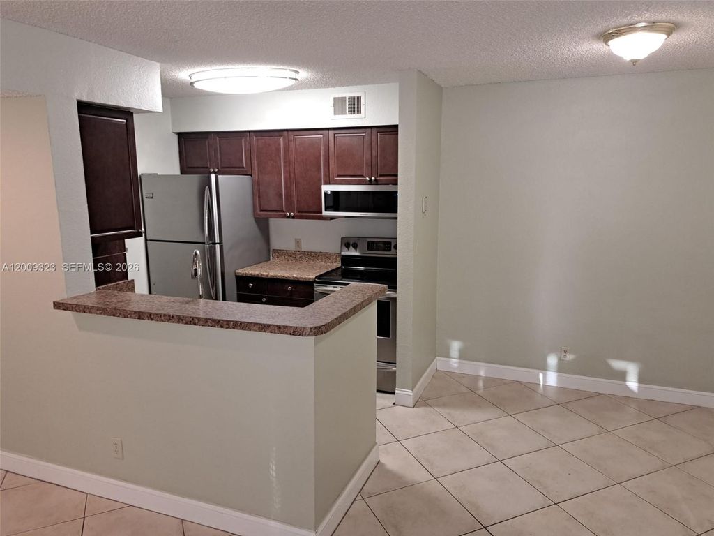Photo of 2796 S University Dr #2106, Davie, FL 33328 (MLS # A12009323)