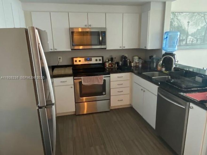 Live and work in the heart of BRICKELL! INTERNET INCLUDED! Enjoy incredible sunset views from this remodeled 1 bedroom, 1 1/2 bathroom condo apartment. Extra bathroom a real plus.  Stainless Steel Appliances, Full Size Washer/Dryer. Granite countertops in Kitchen and Bathrooms., Kitchen wall removed for open design concept. Porcelain tile floors throughout (including tile in Hugh Balcony). Assigned covered parking, 24hour lobby attendant, Beautiful new modern gym, and infinity pool. Valet Service, and Wifi in lounge areas. Convenient to Miami Metromover, train, Bus lines, I95, 836, US 1, Publix, and Brickell CitiCenter. Also - just steps away from a myriad of restaurants.