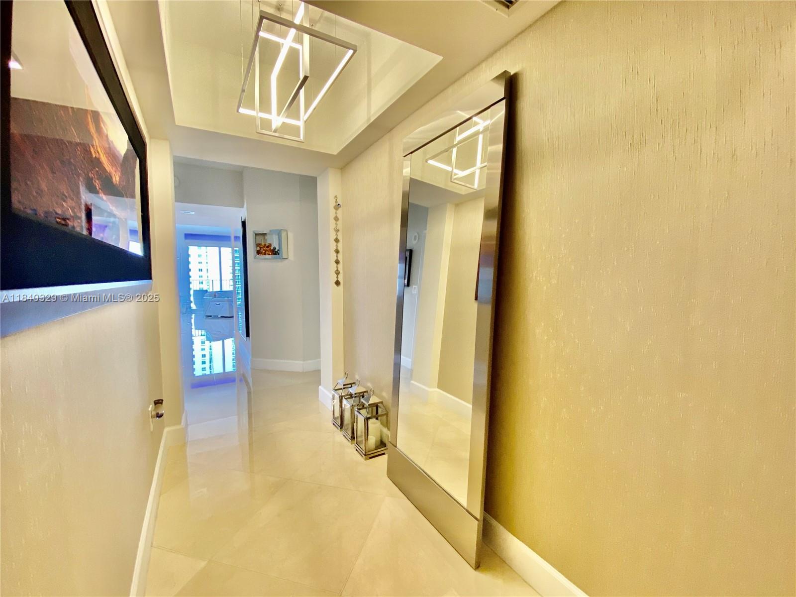 Beautifully corner unit, largest line in the 3/3 units. Done with the finest of tastes, with Italian marble floors
throughout, Italian kitchen w/ wood cabinets w/ granite countertops & stainless steel appliances. State of the arts
led fixtures, custom Closets, blackout windows on the 3 rooms, hurricane impact windows. Unit comes with 2
parking spaces assigned and storage. Turnberry village offers a full range of amenities including state of the art
fitness center, spa, resort style pool, 24/7 secured lobby and Valet, party room, billiards room. Steps to Aventura
Mall and less than a 5 minute trip to the beach! A must see.
Electric shades ( Somfy Sistem from France )