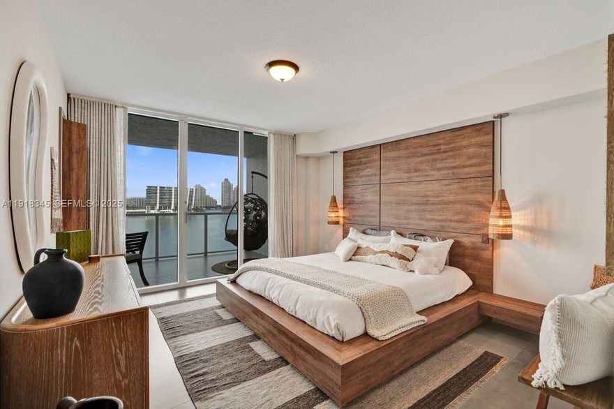 Completely REMODELED 9th floor 2 bedroom Condo with Breathtaking views on Intracoastal/Bay area of Sunny Isles Beach.  With its NEW ROOF and security systems done in 2024 along with all NEW AC and Tankless water heater this condo has all the real attributes of Move in ready and NO FINANCIAL obligations in near future!  Close to multiple high end restaurants and quick walking distance to the beach and shoping boutiques and infamous Aventura Mall close by!  Huge Heated Pool and Gym