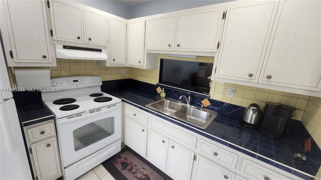 Photo of 4299 NW 16th St #209, Lauderhill, FL 33313 (MLS # A11993705)