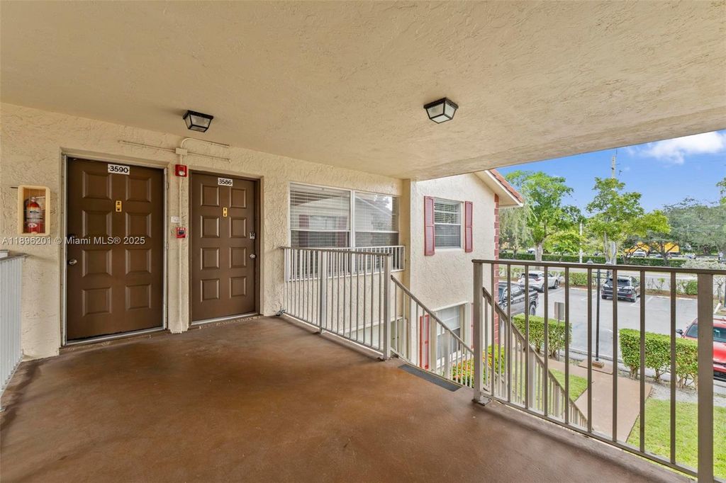 Photo of 3586 N University Dr #U-6, Coral Springs, FL 33065 (MLS # A11896201)