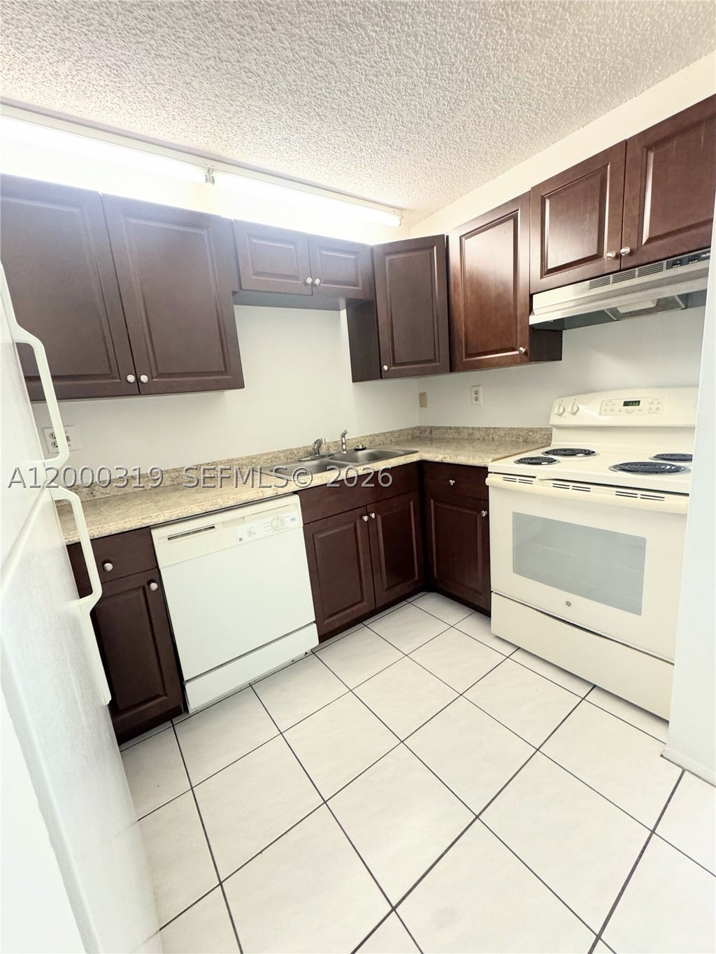 Photo of 11352 Royal Palm Blvd #11352, Coral Springs, FL 33065 (MLS # A12000319)