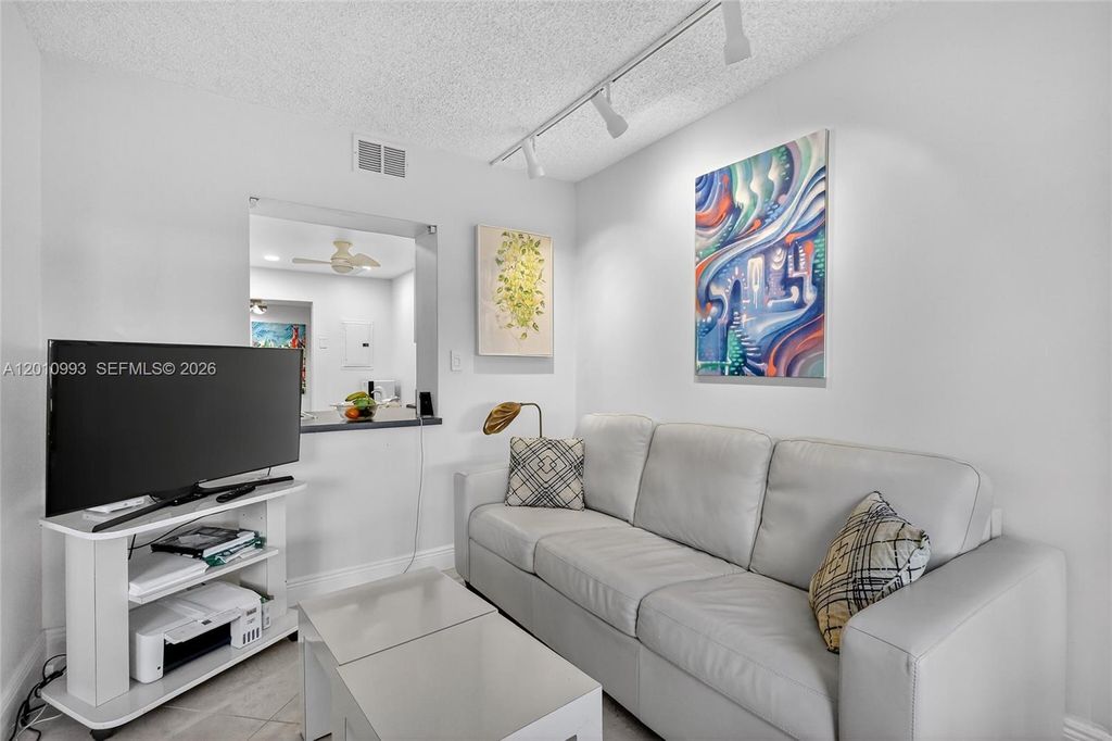 Photo of 1000 Parkview Dr #104, Hallandale Beach, FL 33009 (MLS # A12010993)